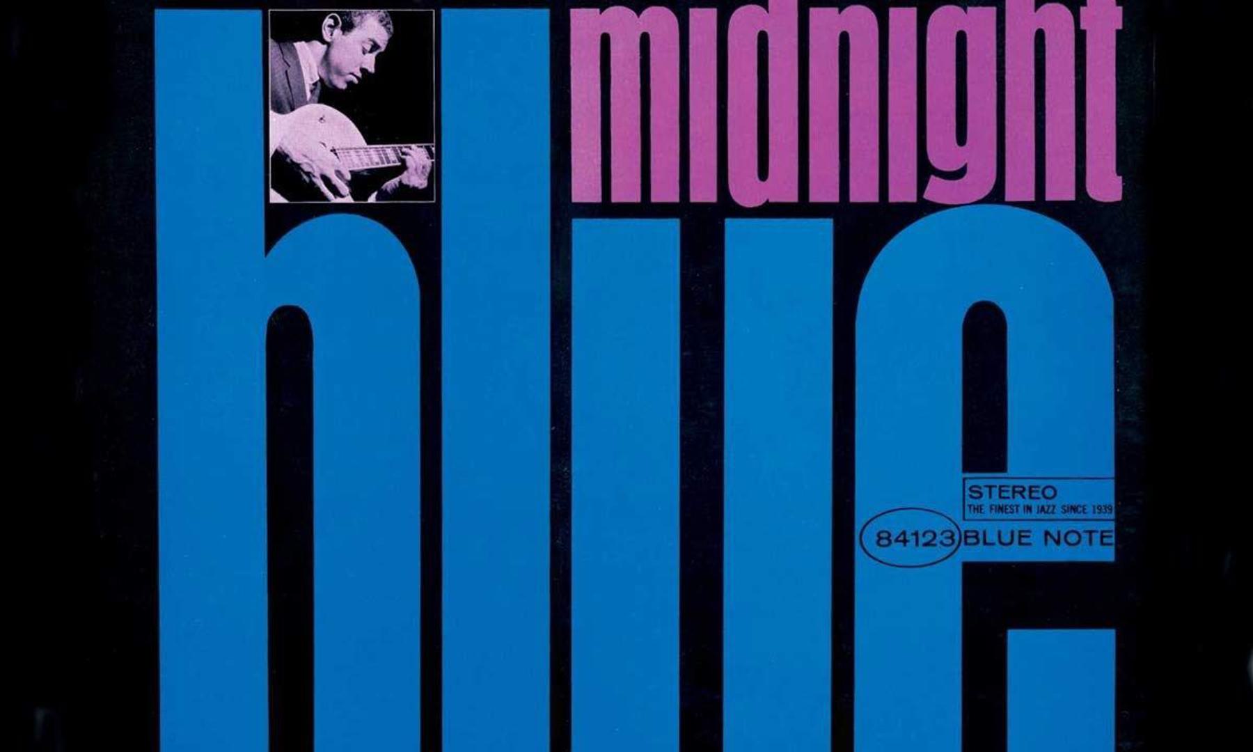 Album cover featuring a guitarist in a small square at the top left, with large blue and pink text reading "midnight blue" on a black background.